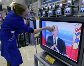 Путин на телеэкранах. Фото с сайта www.photosight.ru